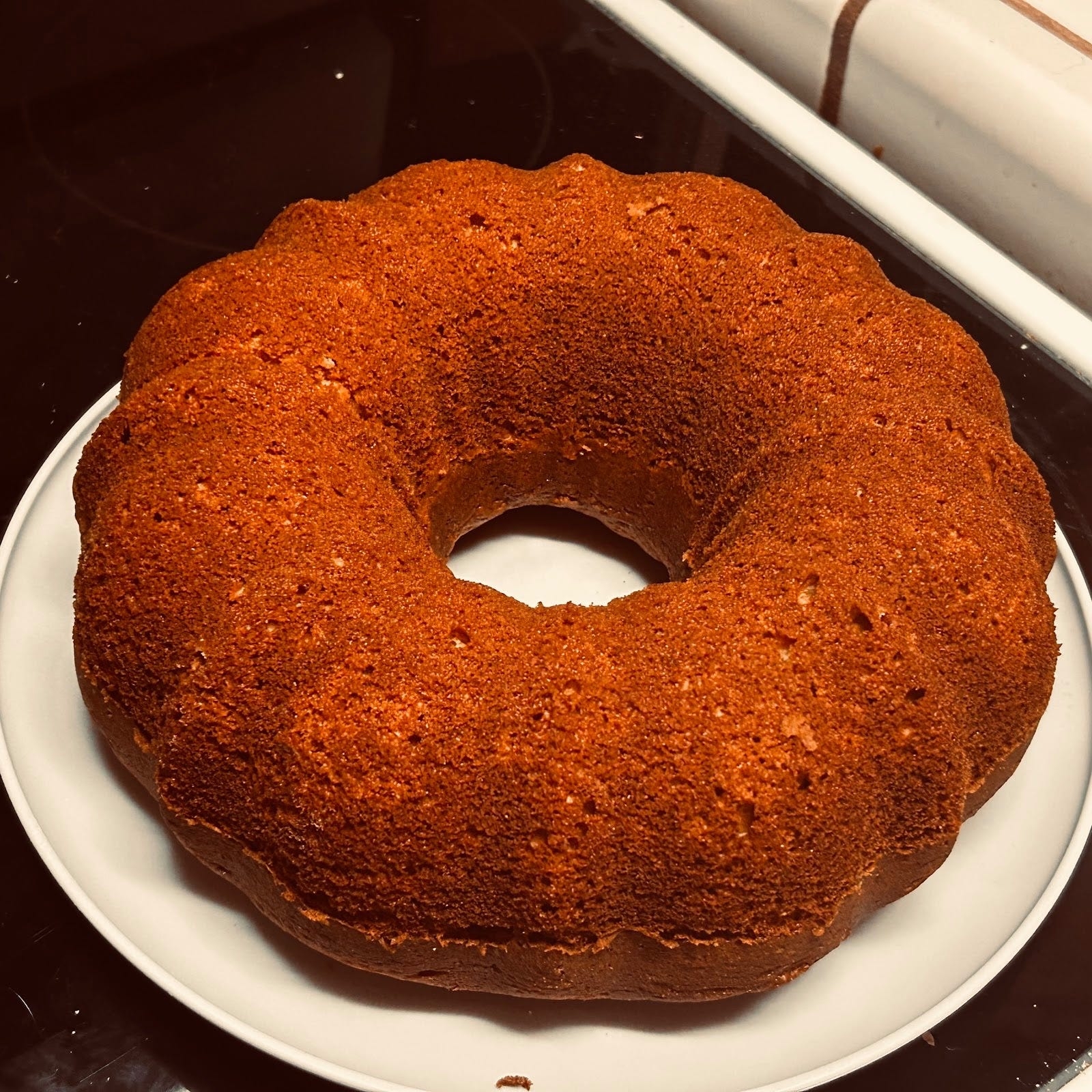 rum cake crossword clue