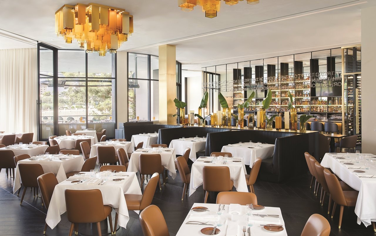 puck's flagship restaurant crossword