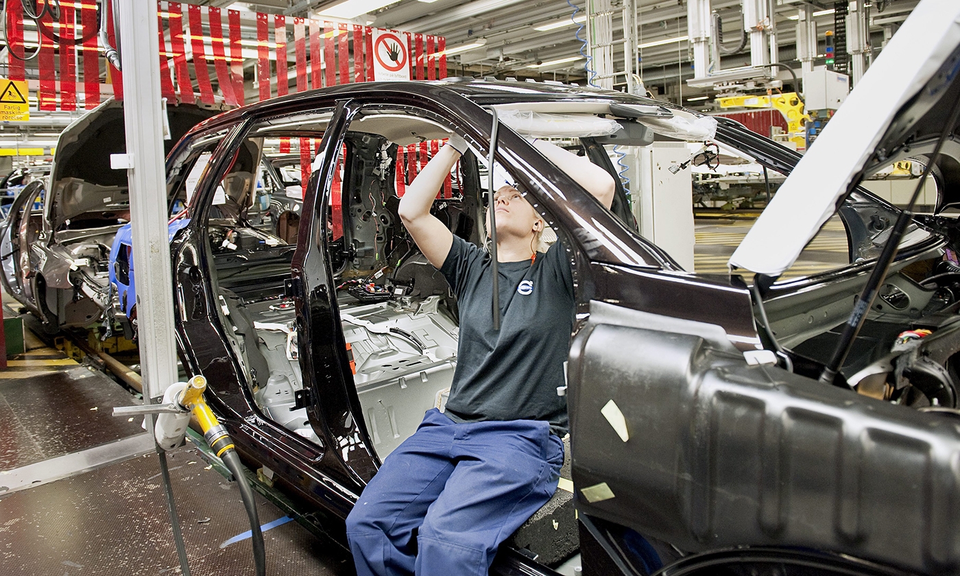 assembly line machine crossword clue